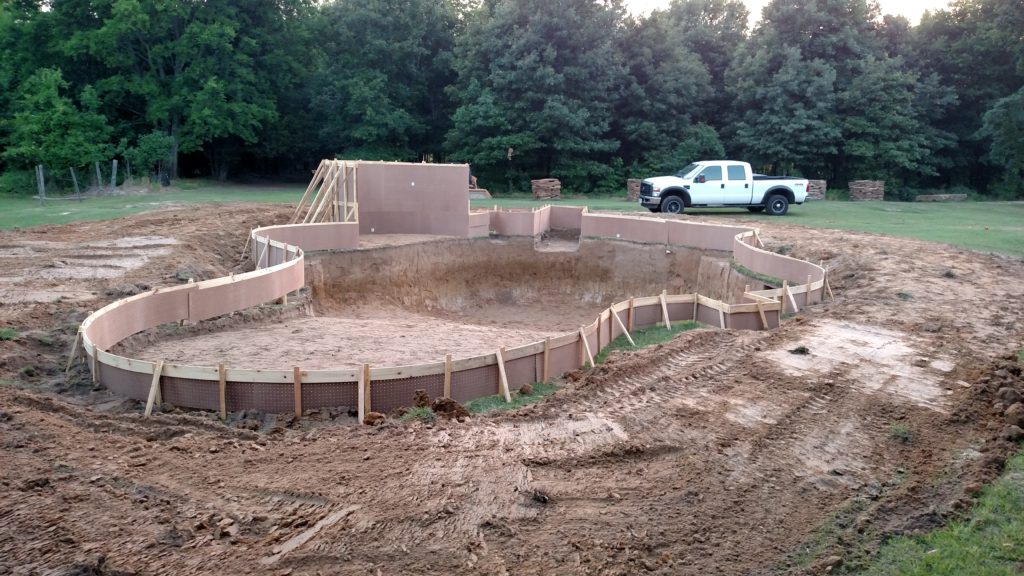 excavation complete and forms set on a free form pool